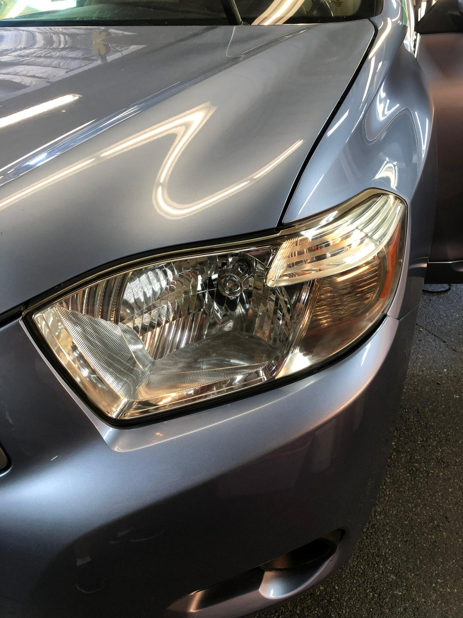 Headlight restoration result - crystal clear lens at Stop Car
