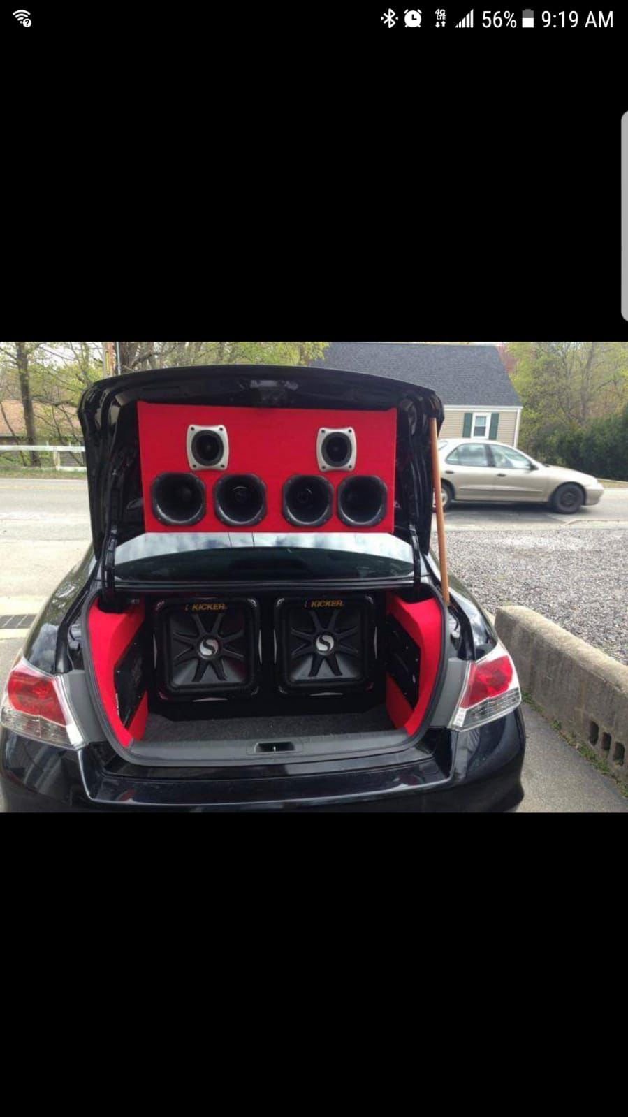 Custom Kicker subwoofer trunk build with red LED lighting